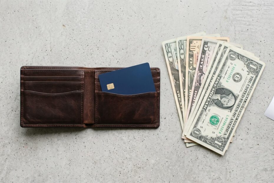 Best cash back credit cards of 2026 — wallet with card and cash representing real money earned from everyday purchases